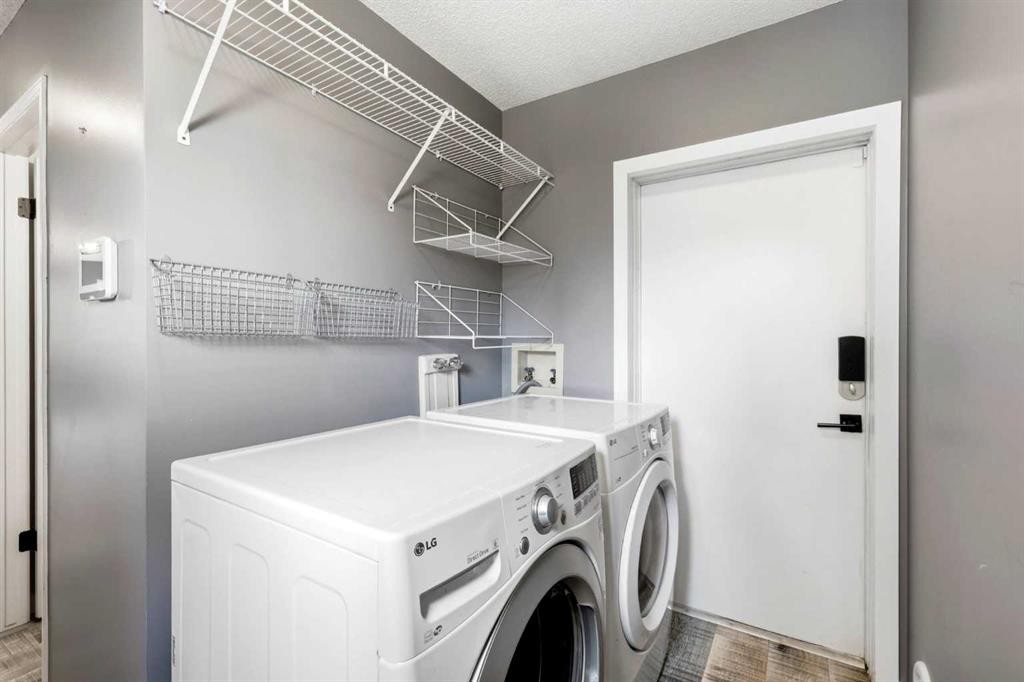 212 Harvest Wood Way Ne, Calgary, AB - Indoor Photo Showing Laundry Room