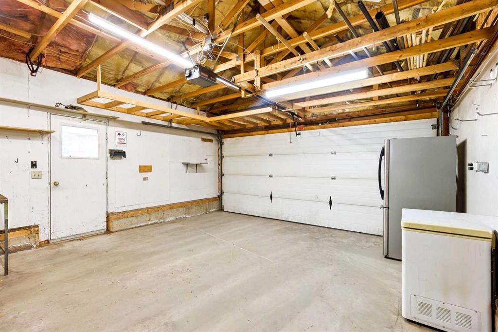 212 Harvest Wood Way Ne, Calgary, AB - Indoor Photo Showing Garage