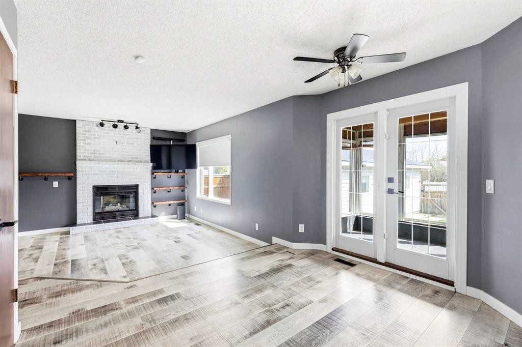 212 Harvest Wood Way Ne, Calgary, AB - Indoor With Fireplace