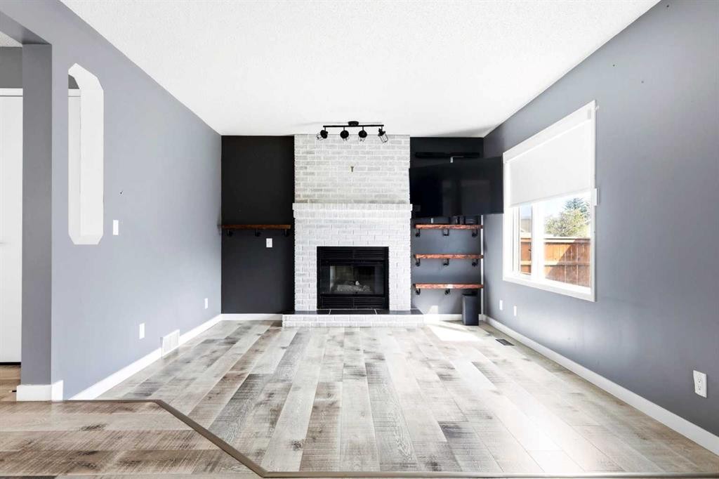 212 Harvest Wood Way Ne, Calgary, AB - Indoor With Fireplace