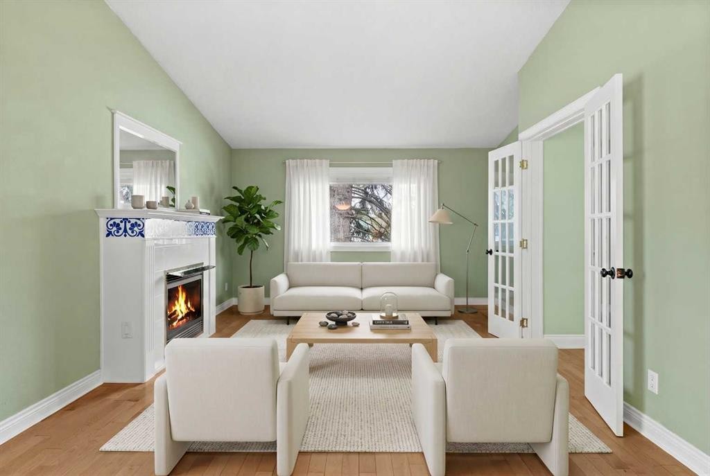 164 Sun Valley Drive Se, Calgary, AB - Indoor Photo Showing Living Room With Fireplace