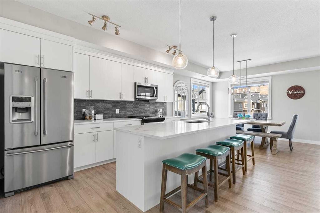 306 Cranbrook Walk Se, Calgary, AB - Indoor Photo Showing Kitchen With Upgraded Kitchen