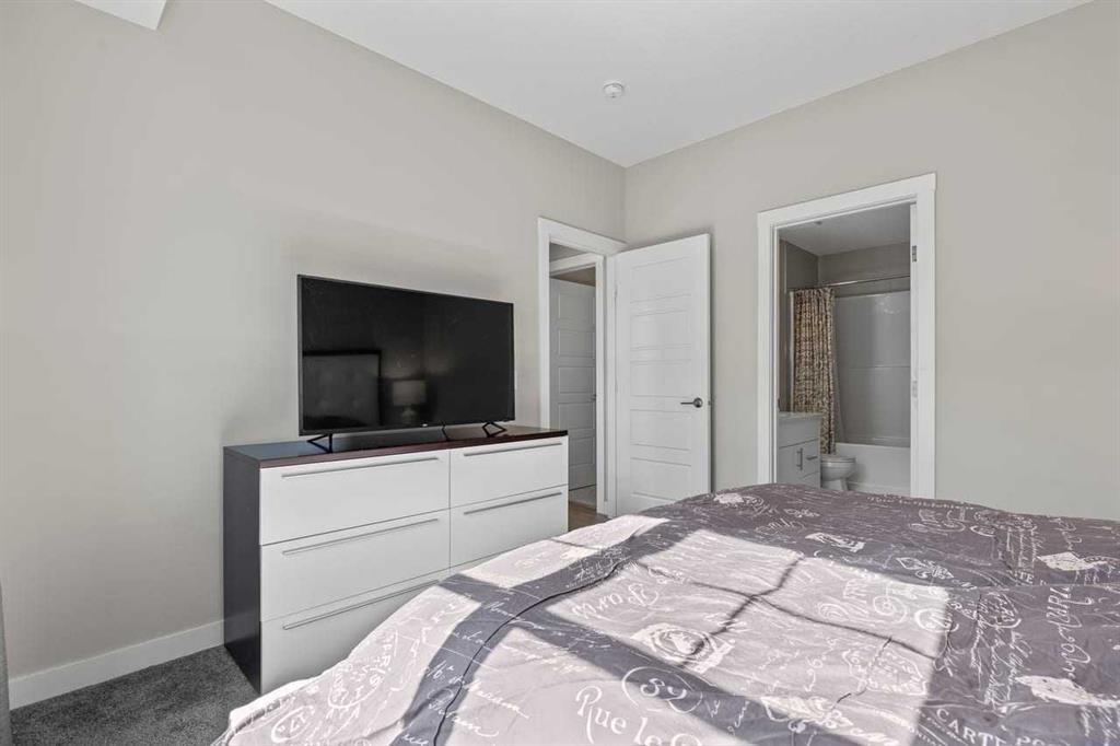 306 Cranbrook Walk Se, Calgary, AB - Indoor Photo Showing Bedroom