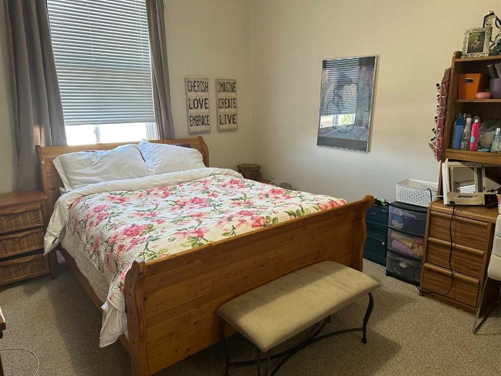 1435 22 Avenue, Didsbury, AB - Indoor Photo Showing Bedroom