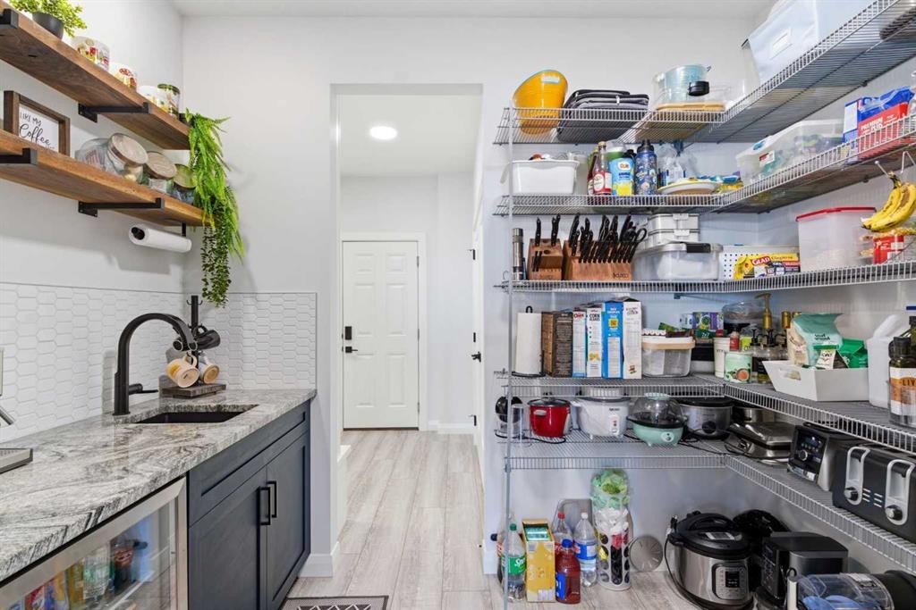 303 Rivercrest Boulevard, Cochrane, AB - Indoor Photo Showing Kitchen
