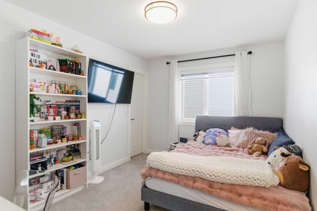 303 Rivercrest Boulevard, Cochrane, AB - Indoor Photo Showing Bedroom