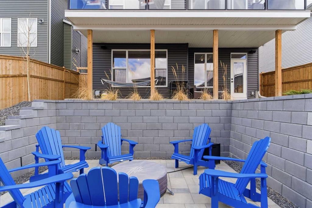 303 Rivercrest Boulevard, Cochrane, AB - Outdoor With Deck Patio Veranda With Exterior