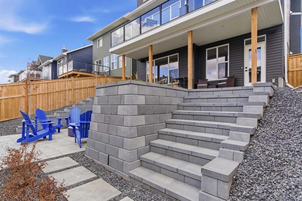 303 Rivercrest Boulevard, Cochrane, AB - Outdoor With Deck Patio Veranda