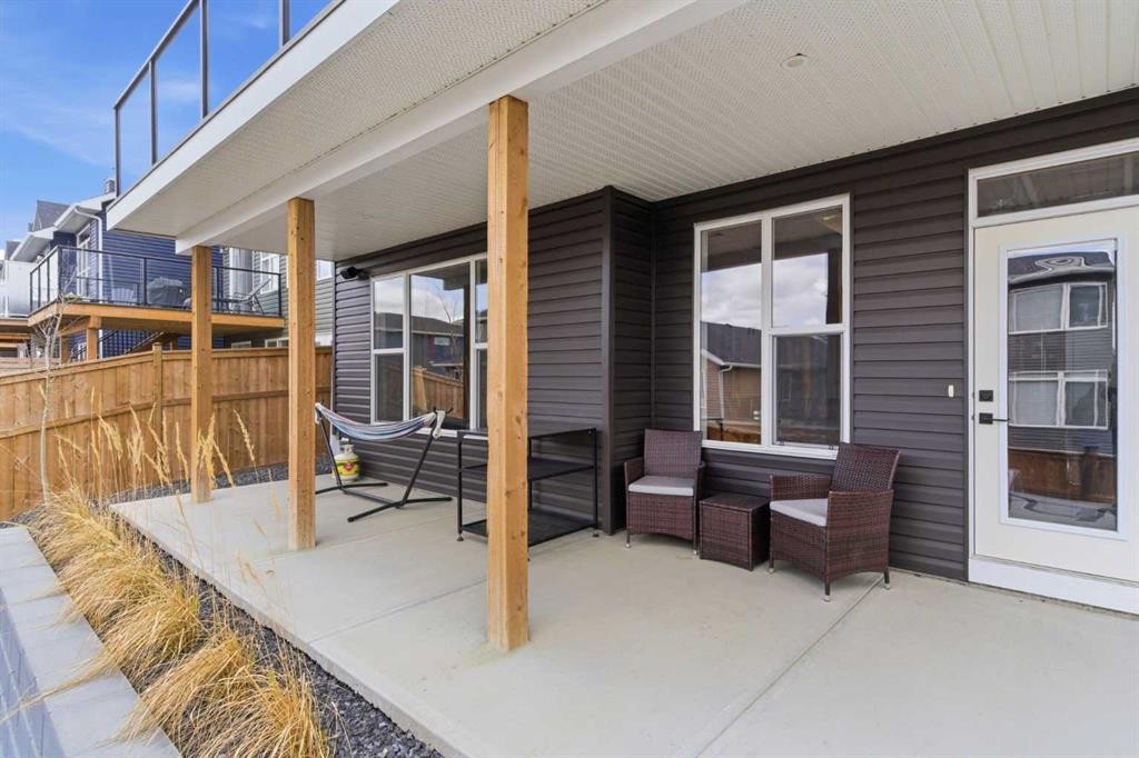303 Rivercrest Boulevard, Cochrane, AB - Outdoor With Deck Patio Veranda With Exterior