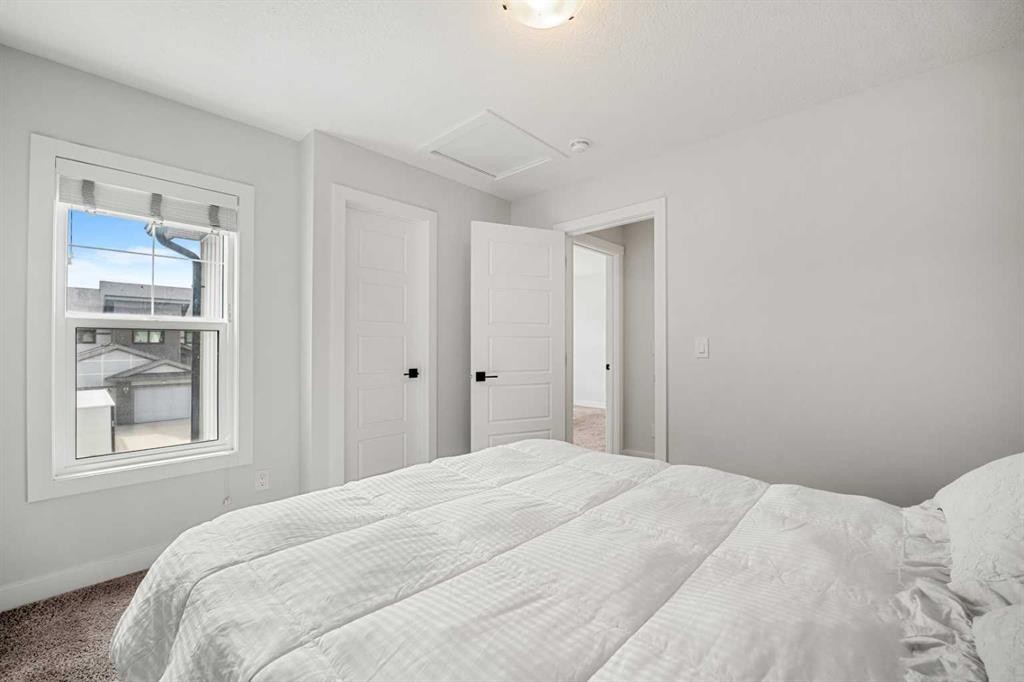 851 Seton Circle Se, Calgary, AB - Indoor Photo Showing Bedroom