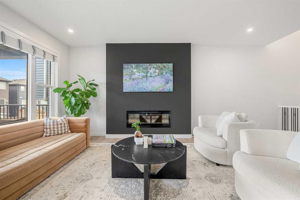 851 Seton Circle Se, Calgary, AB - Indoor Photo Showing Living Room With Fireplace