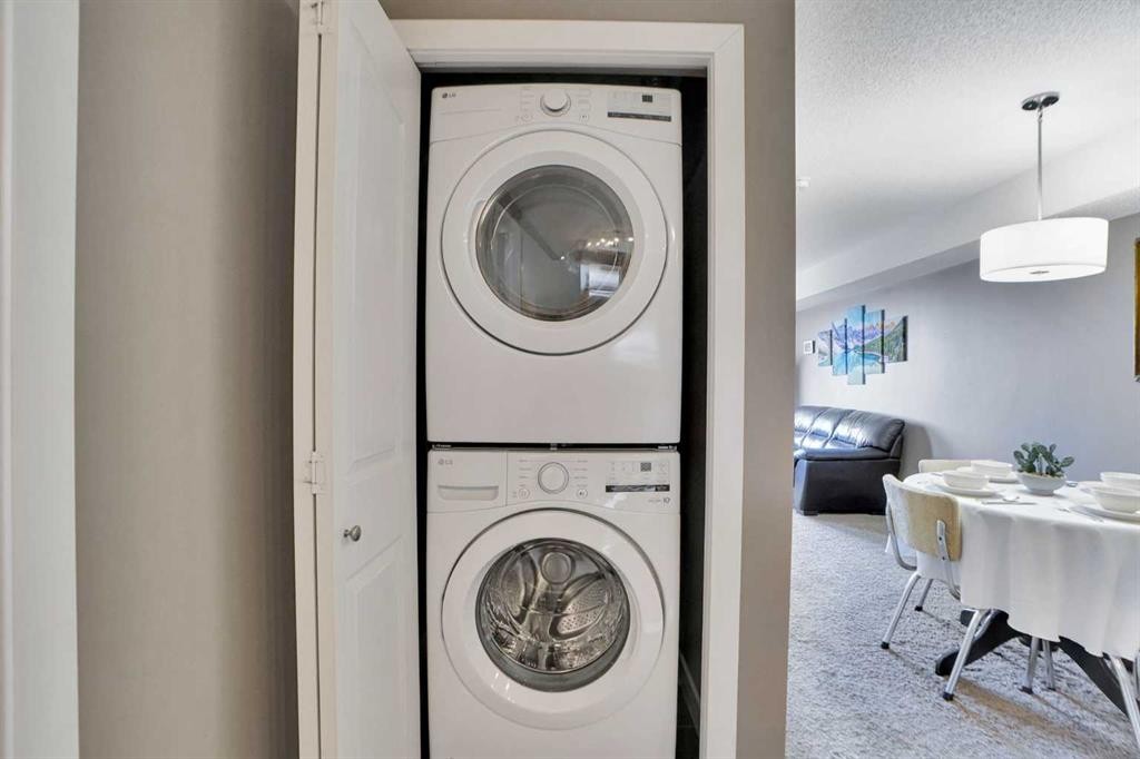 414-7210 80 Avenue Ne, Calgary, AB - Indoor Photo Showing Laundry Room