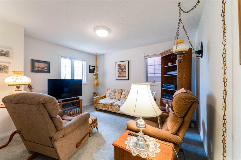 8 Prominence Path Sw, Calgary, AB - Indoor Photo Showing Living Room