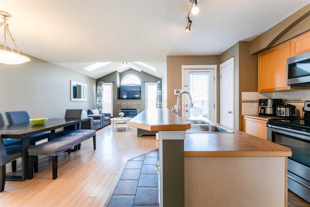 140 Prestwick Avenue Se, Calgary, AB - Indoor Photo Showing Kitchen With Stainless Steel Kitchen With Double Sink