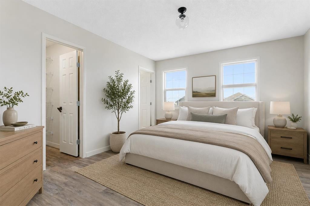 202 Sunset Heights, Cochrane, AB - Indoor Photo Showing Bedroom