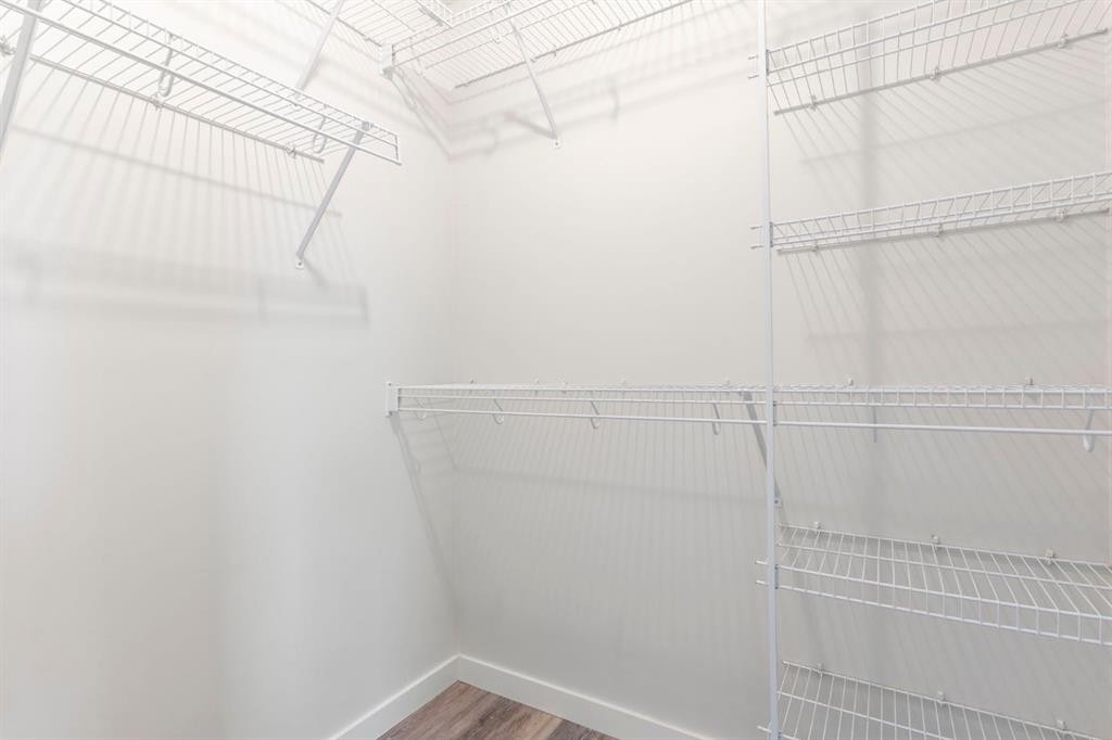 202 Sunset Heights, Cochrane, AB - Indoor With Storage