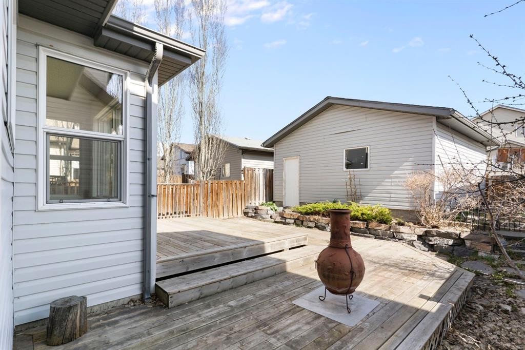 202 Sunset Heights, Cochrane, AB - Outdoor With Deck Patio Veranda With Exterior