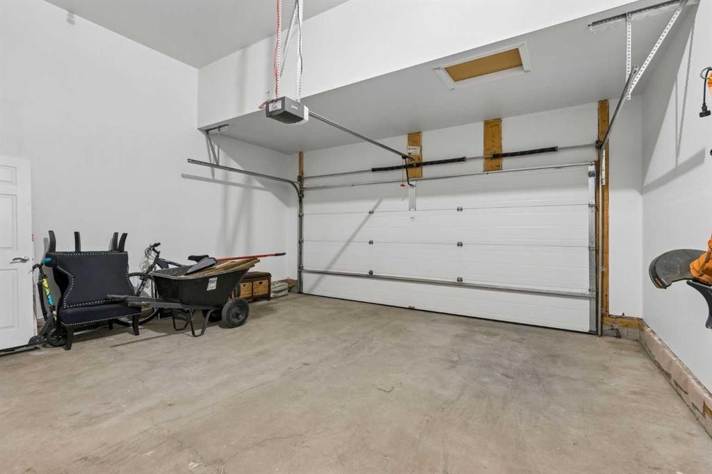 2134 Brightoncrest Common Se, Calgary, AB - Indoor Photo Showing Garage