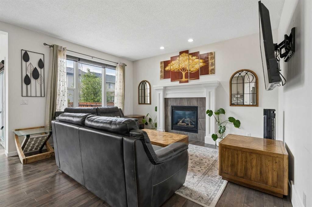 2134 Brightoncrest Common Se, Calgary, AB - Indoor Photo Showing Living Room With Fireplace
