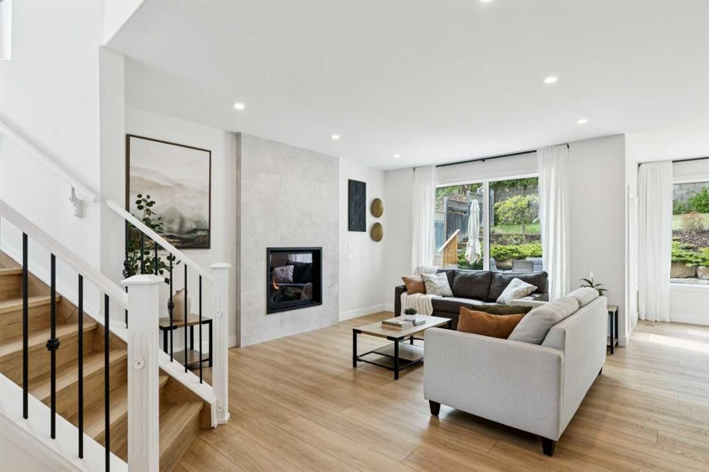 15 Valley Stream Manor Nw, Calgary, AB - Indoor With Fireplace
