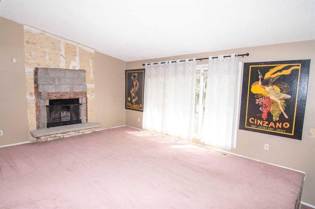 2716 Cedar Ridge Drive Sw, Calgary, AB - Indoor Photo Showing Living Room With Fireplace