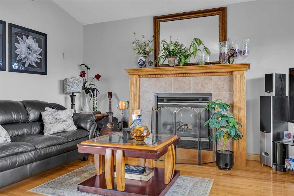 189 Applemead Close Se, Calgary, AB - Indoor Photo Showing Living Room With Fireplace