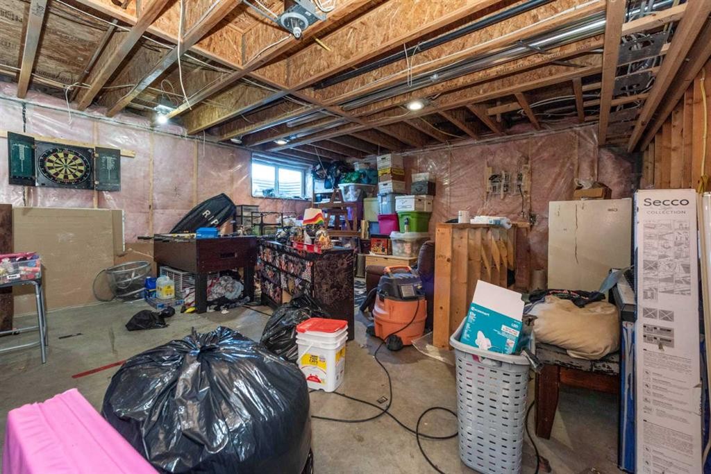 100 Willow Ridge Link, Diamond Valley, AB - Indoor Photo Showing Basement