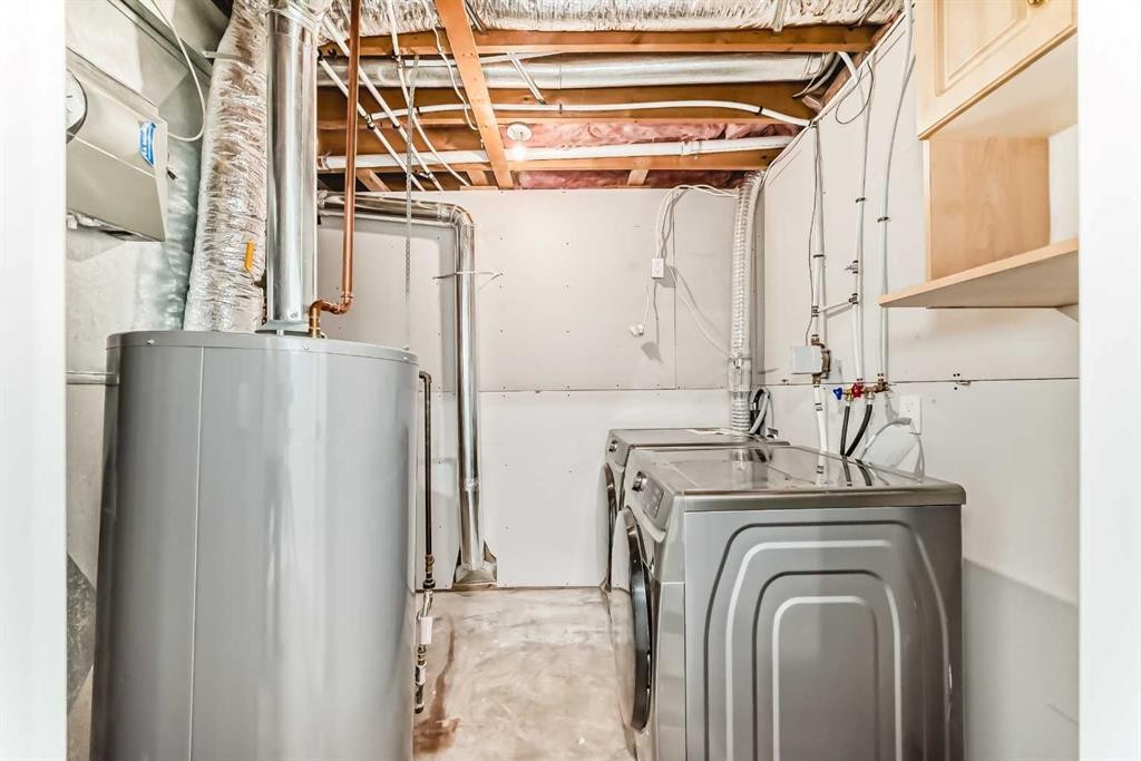 11323 Coventry Boulevard Ne, Calgary, AB - Indoor Photo Showing Laundry Room