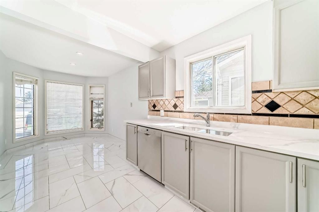 11323 Coventry Boulevard Ne, Calgary, AB - Indoor Photo Showing Kitchen With Double Sink