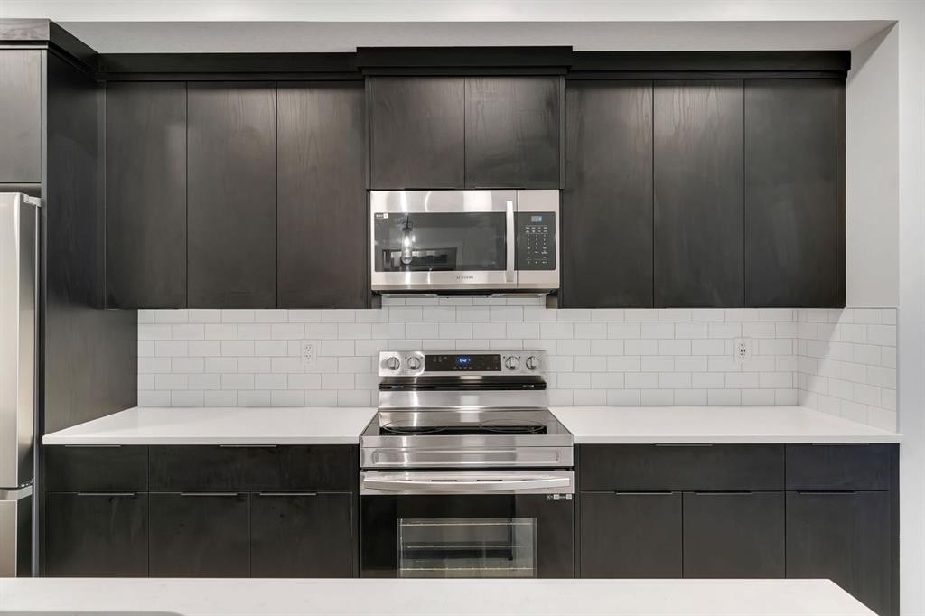 3201-220 Seton Grove Se, Calgary, AB - Indoor Photo Showing Kitchen