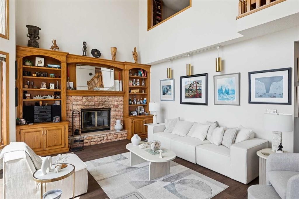 55 Edenstone View Nw, Calgary, AB - Indoor Photo Showing Living Room With Fireplace