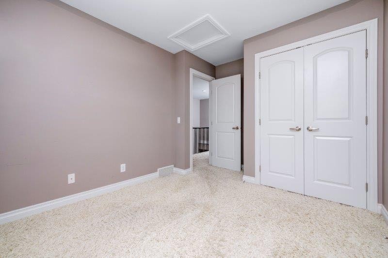 1 Murmansk Way Sw, Calgary, AB - Indoor Photo Showing Other Room
