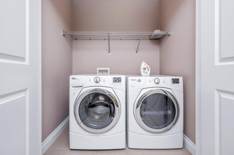 1 Murmansk Way Sw, Calgary, AB - Indoor Photo Showing Laundry Room