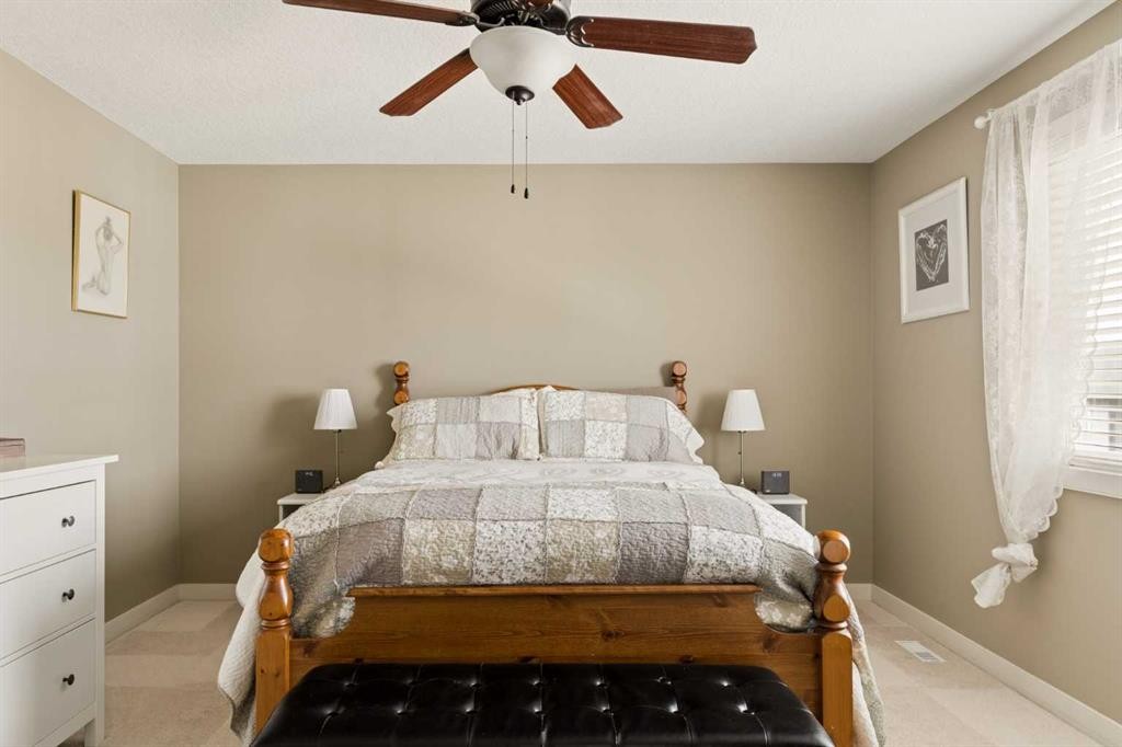 417 Silverado Boulevard Sw, Calgary, AB - Indoor Photo Showing Bedroom