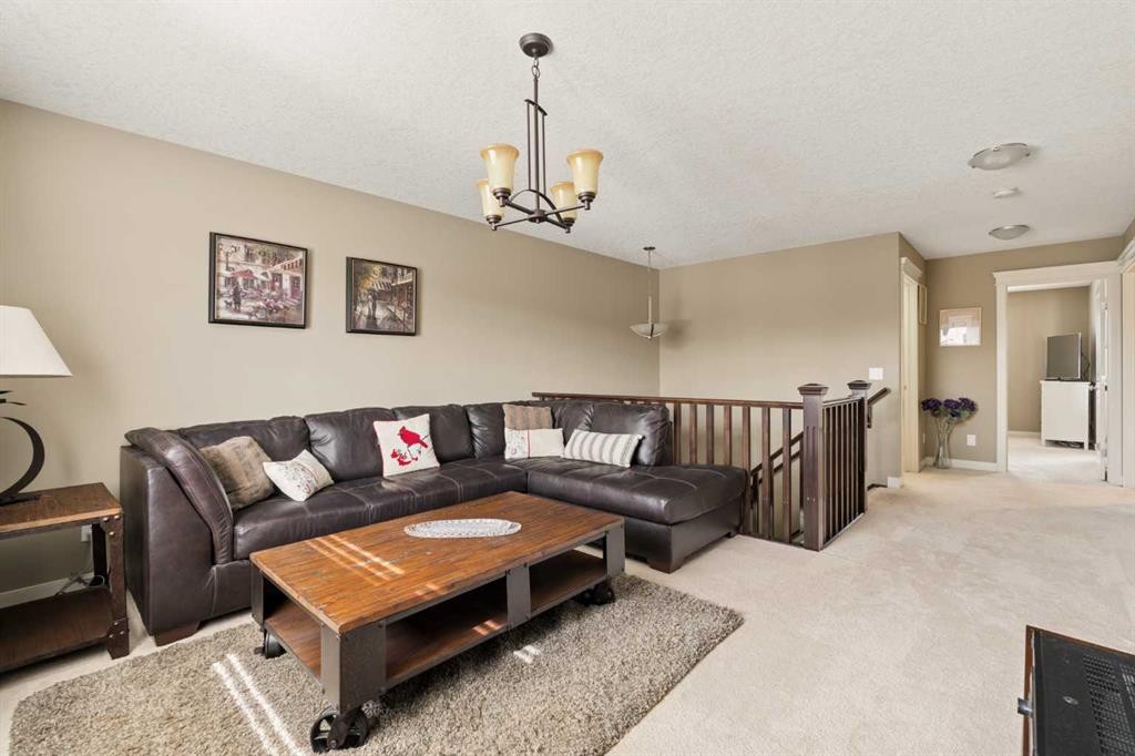 417 Silverado Boulevard Sw, Calgary, AB - Indoor Photo Showing Living Room