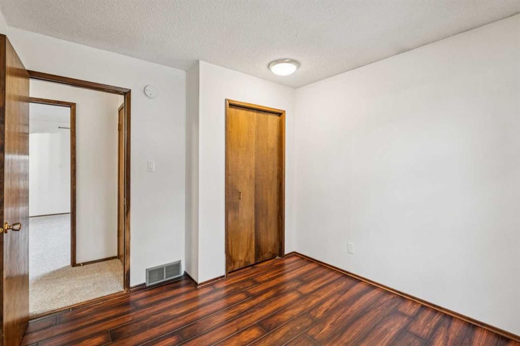 1260 Lake Sylvan Drive Se, Calgary, AB - Indoor Photo Showing Other Room