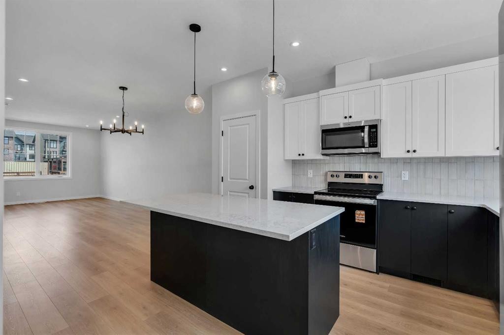 237 Heirloom Way Se, Calgary, AB - Indoor Photo Showing Kitchen With Upgraded Kitchen