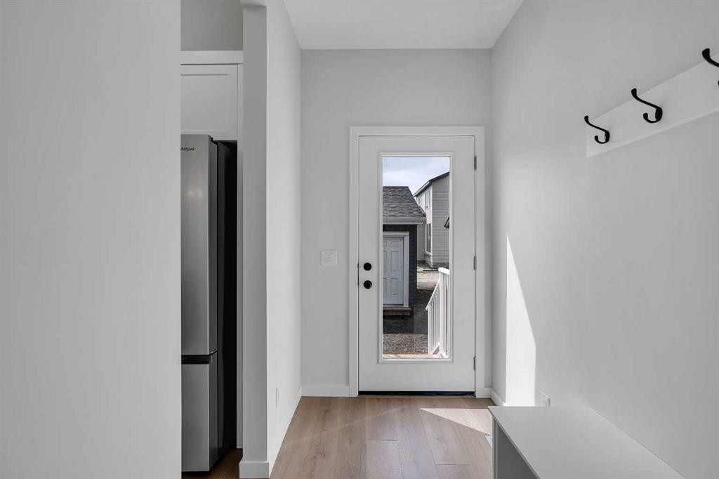 237 Heirloom Way Se, Calgary, AB - Indoor Photo Showing Other Room