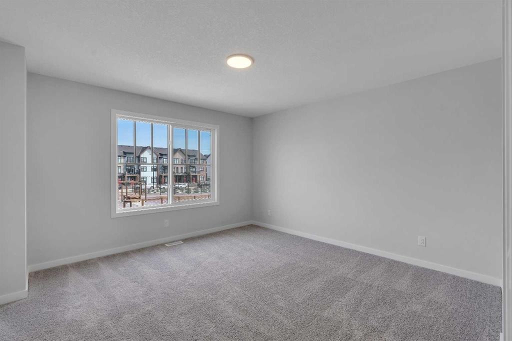 237 Heirloom Way Se, Calgary, AB - Indoor Photo Showing Other Room