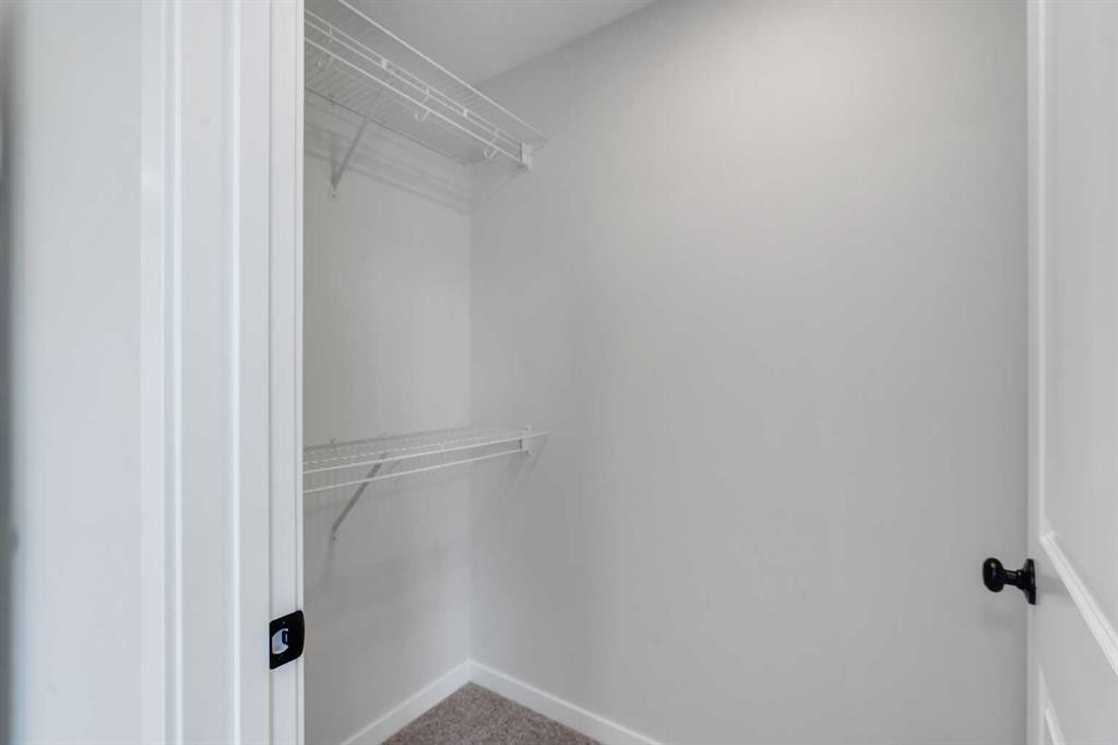 237 Heirloom Way Se, Calgary, AB - Indoor With Storage