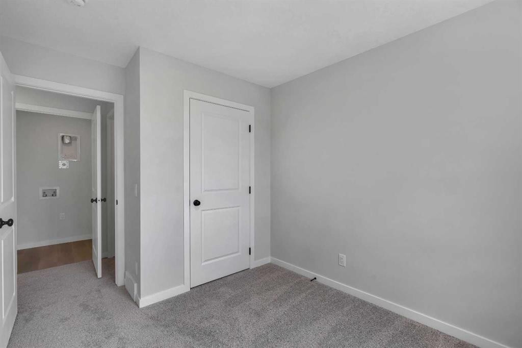 237 Heirloom Way Se, Calgary, AB - Indoor Photo Showing Other Room
