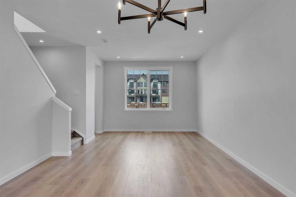 237 Heirloom Way Se, Calgary, AB - Indoor Photo Showing Other Room