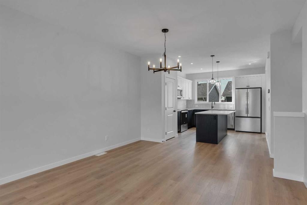 237 Heirloom Way Se, Calgary, AB - Indoor Photo Showing Kitchen With Stainless Steel Kitchen