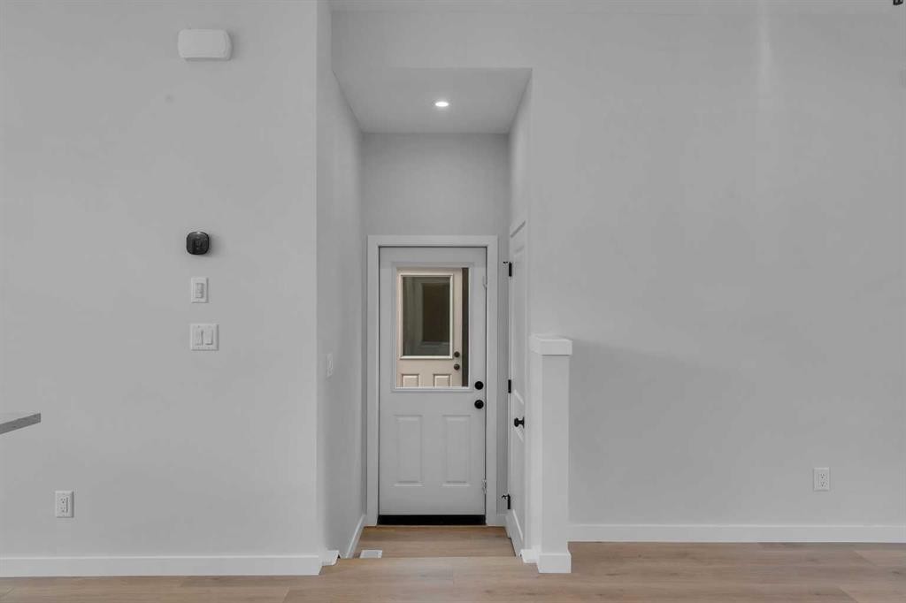 237 Heirloom Way Se, Calgary, AB - Indoor Photo Showing Other Room