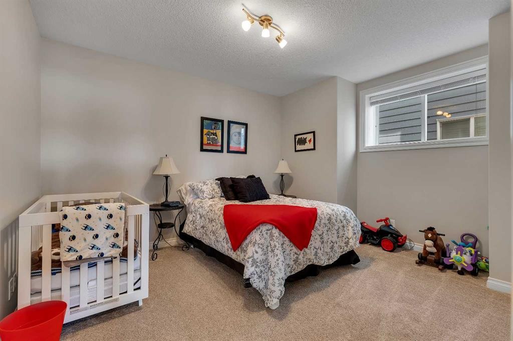 369 Marquis Landing Se, Calgary, AB - Indoor Photo Showing Bedroom