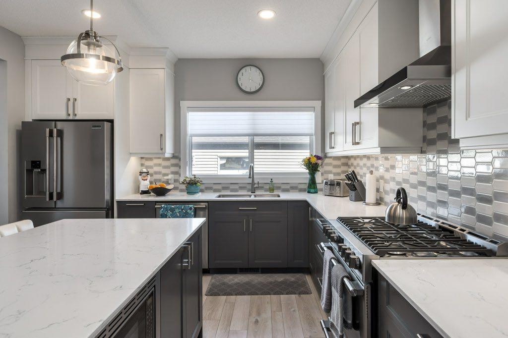 144 Wolf Willow Boulevard Se, Calgary, AB - Indoor Photo Showing Kitchen With Stainless Steel Kitchen With Double Sink With Upgraded Kitchen