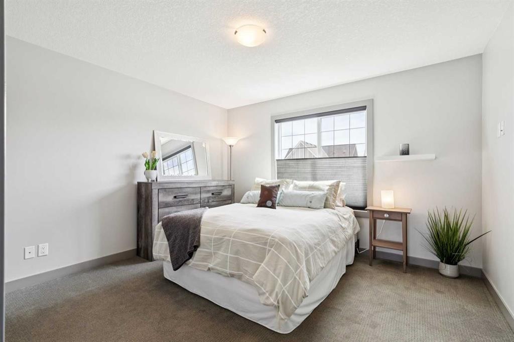 216 Mahogany Grove Se, Calgary, AB - Indoor Photo Showing Bedroom