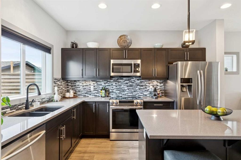 216 Mahogany Grove Se, Calgary, AB - Indoor Photo Showing Kitchen With Double Sink With Upgraded Kitchen