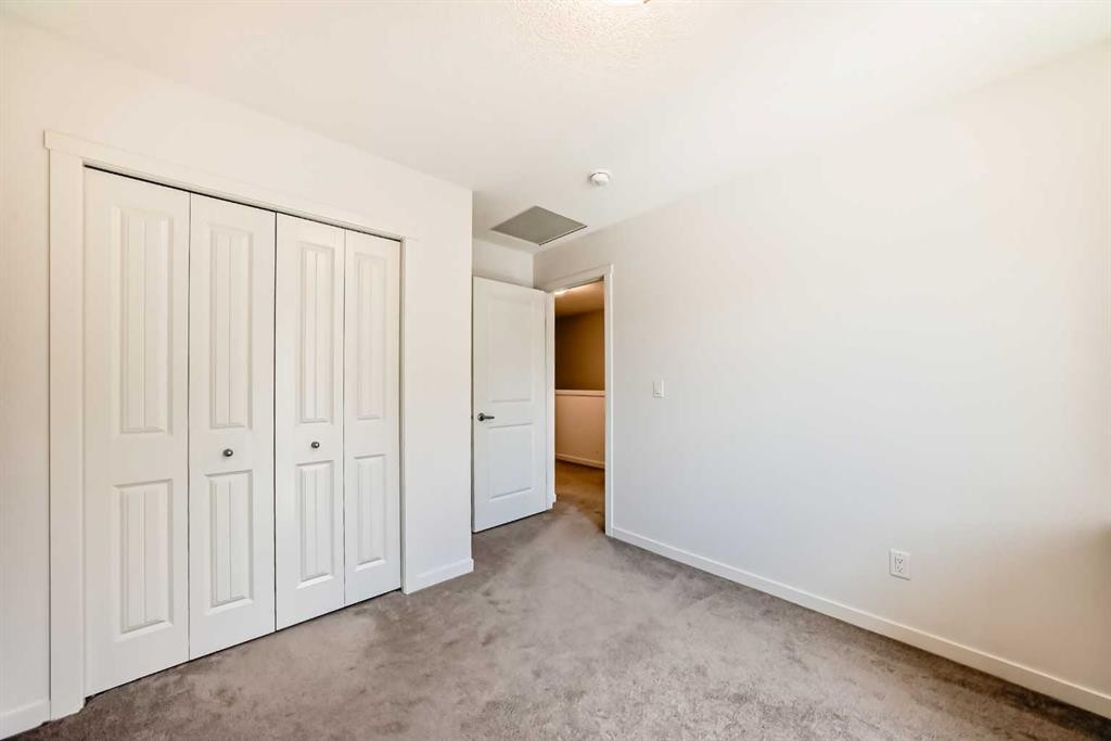 139 Legacy Point Se, Calgary, AB - Indoor Photo Showing Other Room