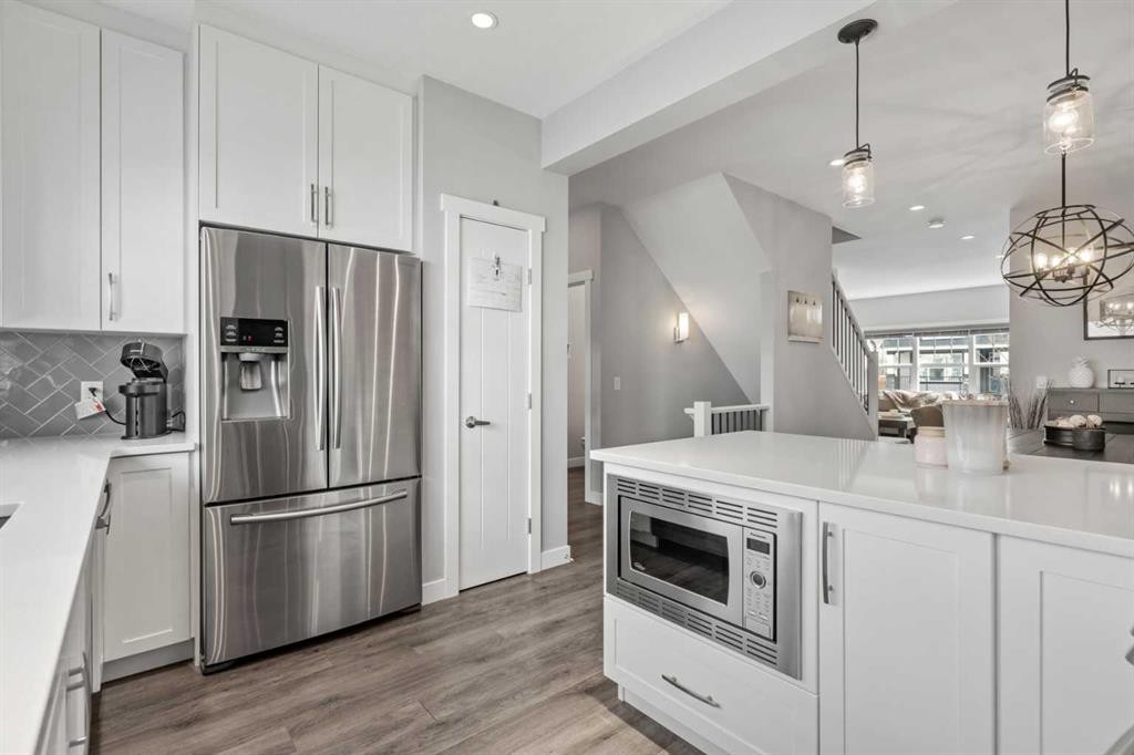11 Masters Manor Se, Calgary, AB - Indoor Photo Showing Kitchen With Stainless Steel Kitchen With Upgraded Kitchen
